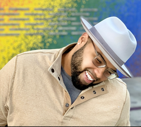 Leroy Mitchell, founder of Heart Kicks, smiling in a white hat